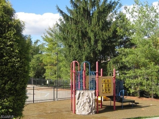 community play area featuring fence
