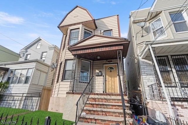 view of front of property with fence