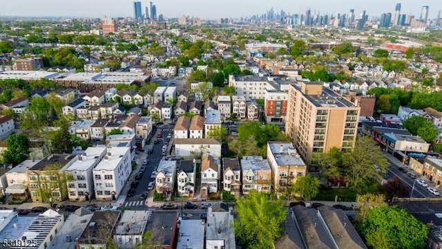 drone / aerial view featuring a city view