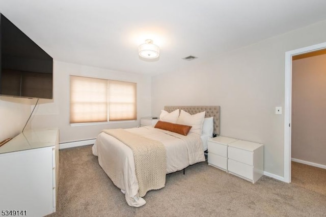 107 S Maple, Park Ridge Boro, NJ 07656 - bedroom featuring baseboard heating, visible vents, light colored carpet, and baseboards
