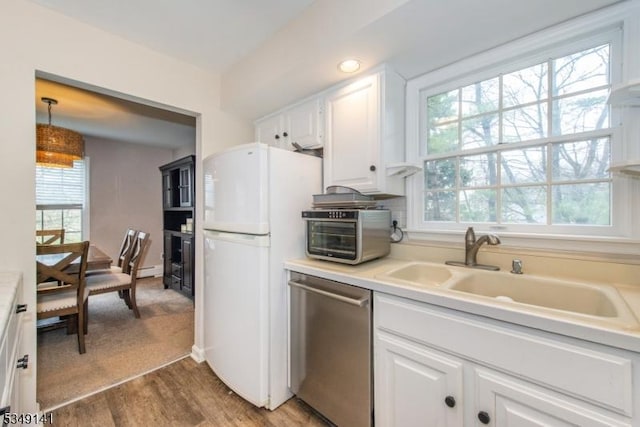 107 S Maple, Park Ridge Boro, NJ 07656 - kitchen featuring white cabinets, dishwasher, a sink, and freestanding refrigerator