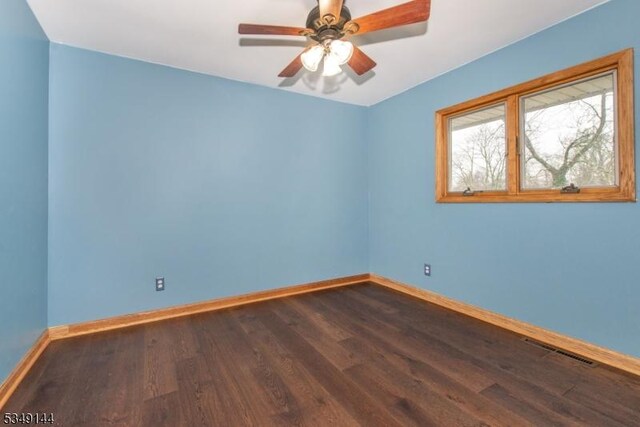 11 Stillwell Rd, South Brunswick Twp, NJ 08824 - spare room with dark wood finished floors, baseboards, and a ceiling fan