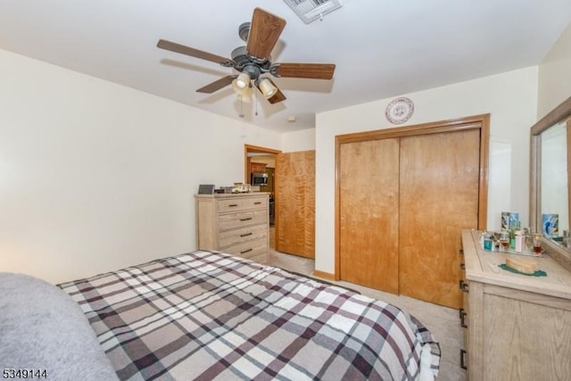 11 Stillwell Rd, South Brunswick Twp, NJ 08824 - bedroom featuring a closet, a ceiling fan, and light colored carpet