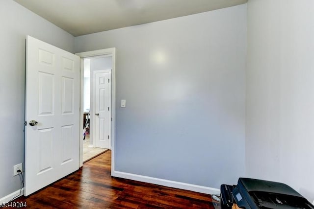 688 S 18th St, Newark City, NJ 07103 - empty room featuring dark wood-style floors and baseboards