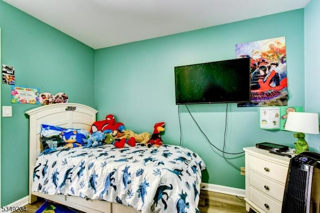 688 S 18th St, Newark City, NJ 07103 - bedroom featuring wood finished floors and baseboards