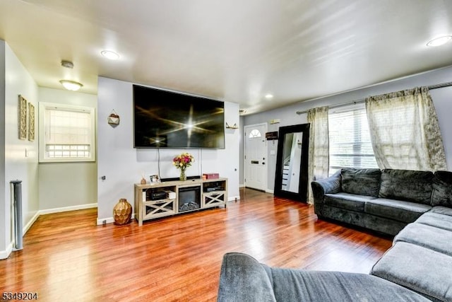 688 S 18th St, Newark City, NJ 07103 - living room featuring wood finished floors, baseboards, and recessed lighting
