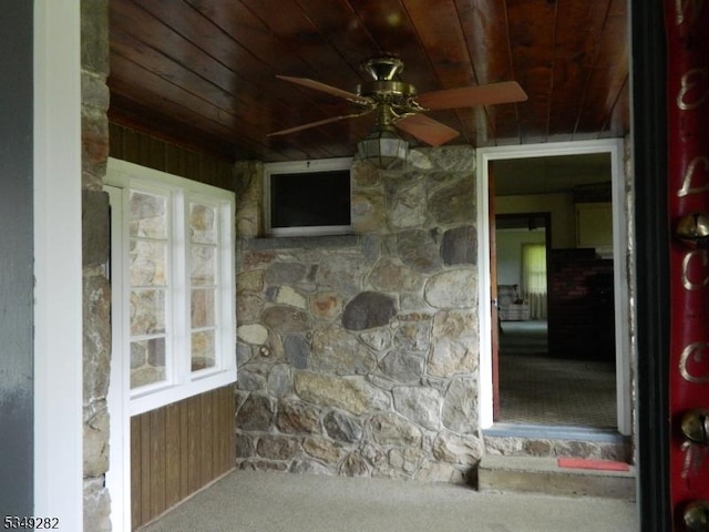 1668 County Rd 565, Vernon Twp, NJ 07461 - view of exterior entry with stone siding and a ceiling fan