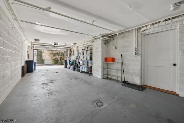garage featuring concrete block wall