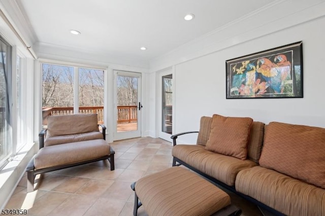 living area with crown molding, light tile patterned floors, and recessed lighting
