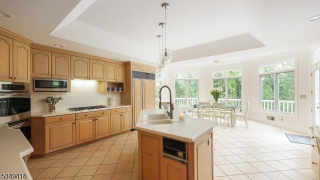 24 Glenview Dr, Warren Twp, NJ 07059 - kitchen with light tile patterned floors, a tray ceiling, appliances with stainless steel finishes, light countertops, and recessed lighting