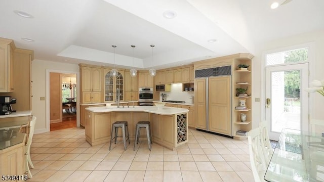 24 Glenview Dr, Warren Twp, NJ 07059 - kitchen featuring stainless steel appliances, light countertops, light tile patterned flooring, a tray ceiling, and open shelves