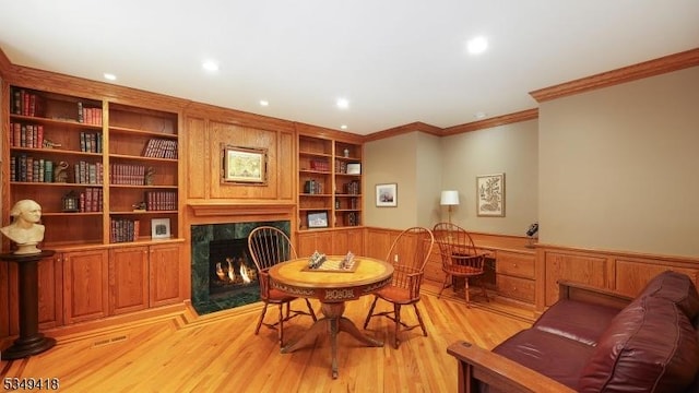 24 Glenview Dr, Warren Twp, NJ 07059 - office area featuring crown molding, a tile fireplace, wainscoting, light wood-style floors, and recessed lighting