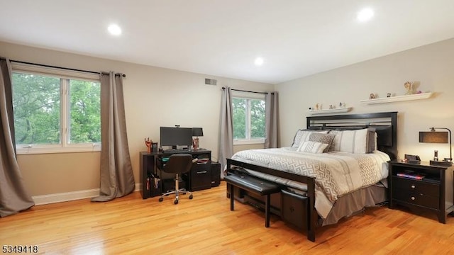24 Glenview Dr, Warren Twp, NJ 07059 - bedroom with multiple windows, light wood-type flooring, recessed lighting, baseboards, and an office area