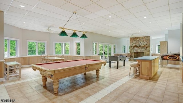 24 Glenview Dr, Warren Twp, NJ 07059 - rec room with billiards, wainscoting, a stone fireplace, and a drop ceiling