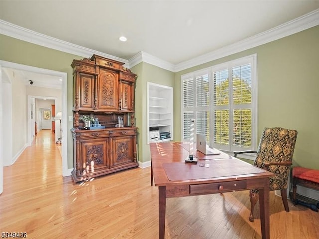 home office featuring baseboards, ornamental molding, recessed lighting, and light wood-style flooring