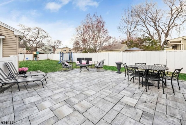 view of patio / terrace with outdoor dining space and a fenced backyard