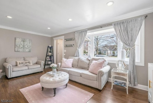living area with crown molding, wood finished floors, baseboards, and recessed lighting