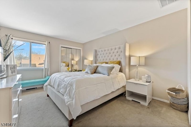 bedroom featuring carpet floors, baseboards, and visible vents