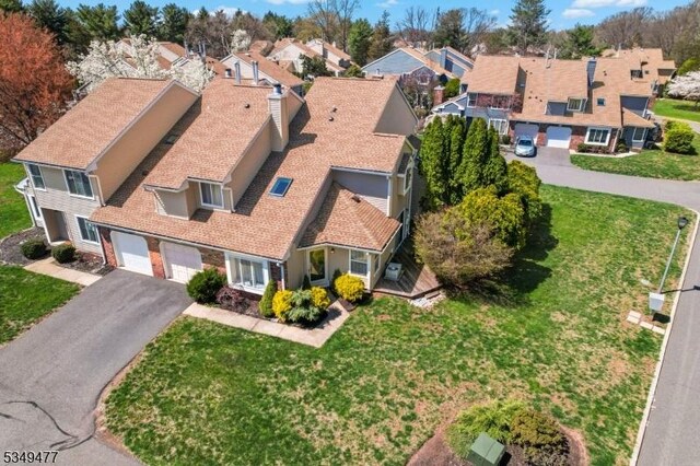 drone / aerial view with a residential view