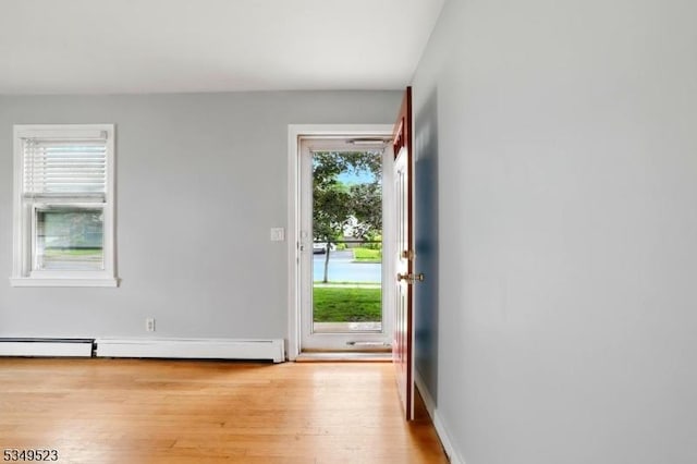 59 James St, Morristown Town, NJ 07960 - foyer entrance with light wood finished floors and baseboard heating