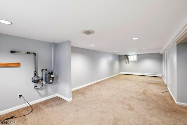 59 James St, Morristown Town, NJ 07960 - basement with baseboard heating, carpet floors, and recessed lighting