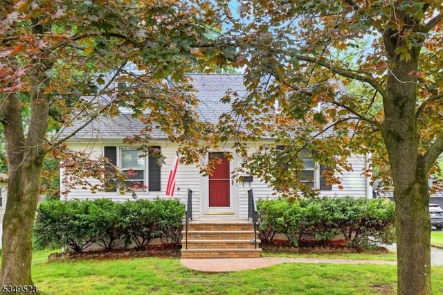 59 James St, Morristown Town, NJ 07960 - view of property hidden behind natural elements with a front yard