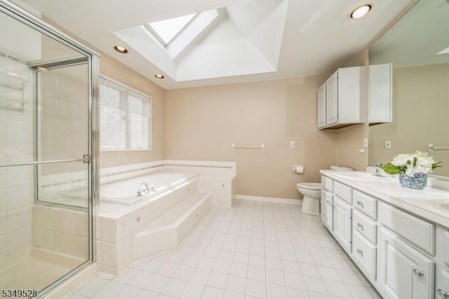 full bath with a skylight, tile patterned floors, a shower stall, a bath, and toilet