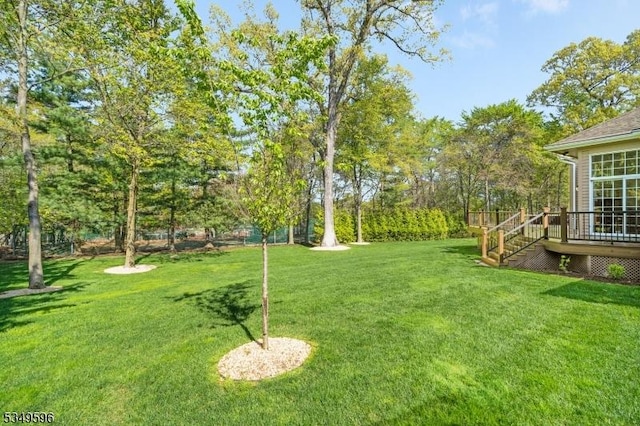 30 Mountain Ridge Dr, Livingston Twp, NJ 07039 - view of green lawn featuring a wooden deck