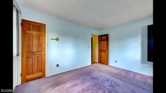 unfurnished bedroom with carpet floors