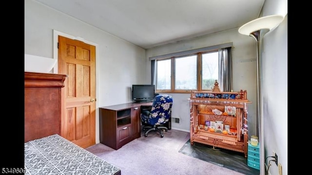 office space featuring light colored carpet and visible vents