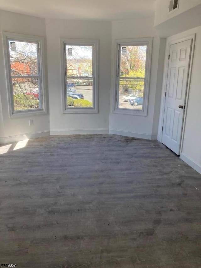 214 Cleveland St, City Of Orange Twp, NJ 07050 - spare room featuring visible vents, baseboards, and wood finished floors