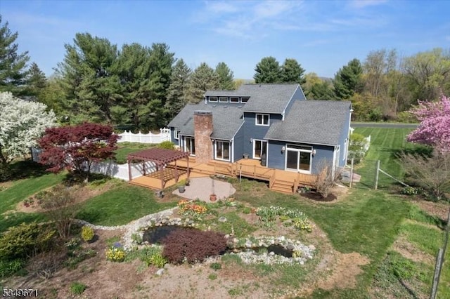 rear view of property with a deck