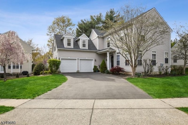 traditional home featuring driveway and a front lawn