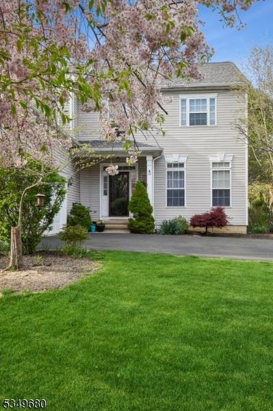 traditional home with a front yard