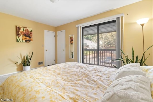 bedroom featuring access to outside