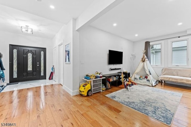 entryway featuring recessed lighting, baseboards, and hardwood / wood-style flooring