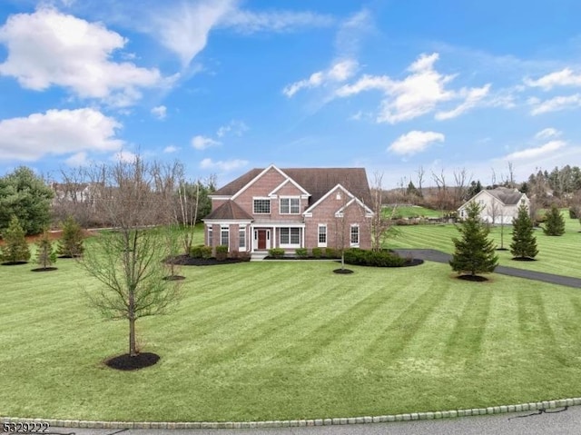 view of front of home with a front lawn