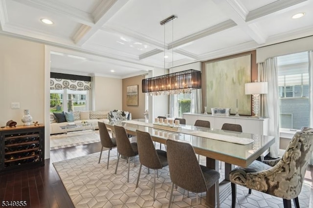 dining room with recessed lighting, crown molding, beamed ceiling, coffered ceiling, and wood finished floors