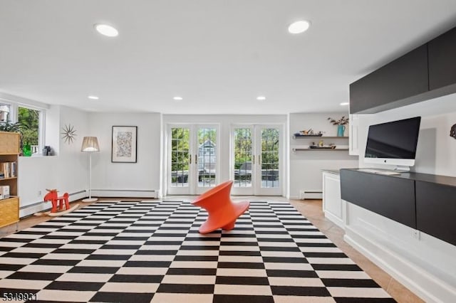 playroom featuring baseboard heating and recessed lighting