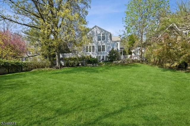 view of yard featuring fence