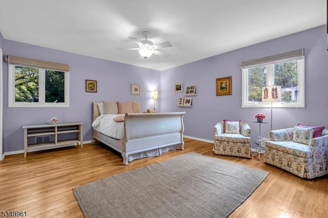 1056 Buxton Rd, Bridgewater Twp, NJ 08807 - bedroom featuring multiple windows and light wood-type flooring