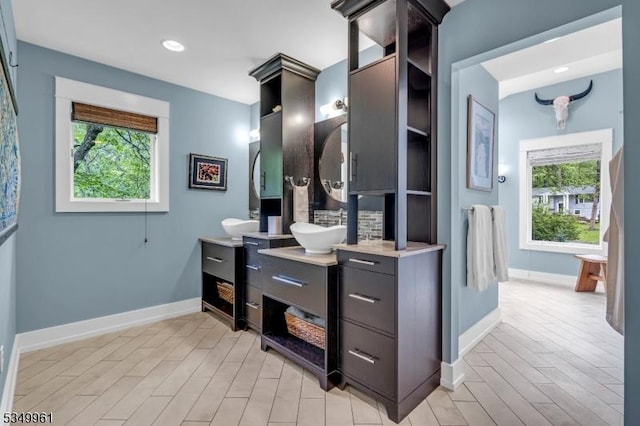 1056 Buxton Rd, Bridgewater Twp, NJ 08807 - full bath featuring plenty of natural light, vanity, baseboards, and recessed lighting