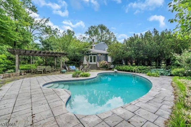 1056 Buxton Rd, Bridgewater Twp, NJ 08807 - swimming pool featuring a pergola, a patio, and view of scattered trees