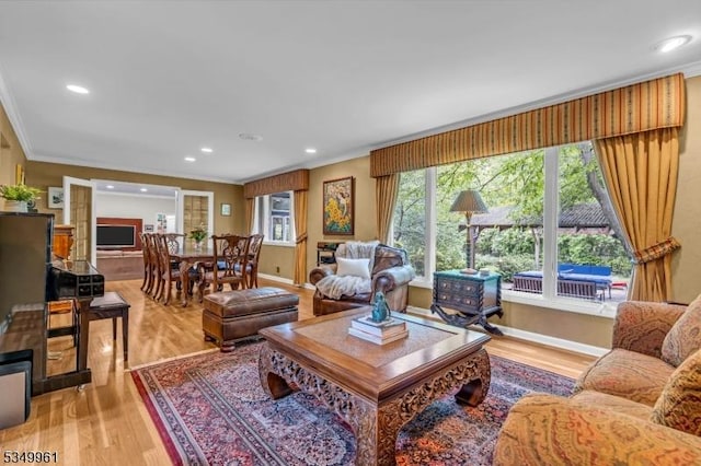 1056 Buxton Rd, Bridgewater Twp, NJ 08807 - living area with ornamental molding, light wood-style floors, recessed lighting, and baseboards