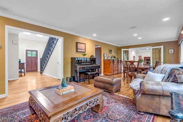 1056 Buxton Rd, Bridgewater Twp, NJ 08807 - living area featuring light wood-type flooring, stairs, ornamental molding, recessed lighting, and baseboards