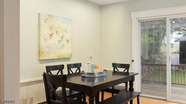 dining room with wood finished floors
