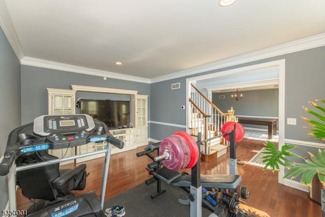 8 Marcin Way, Mount Olive Twp, NJ 07836 - workout area with wood finished floors, crown molding, a chandelier, baseboards, and recessed lighting