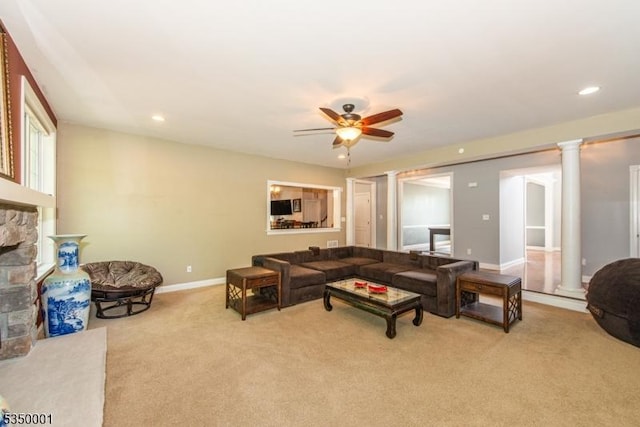 8 Marcin Way, Mount Olive Twp, NJ 07836 - carpeted living room featuring ornate columns, ceiling fan, a stone fireplace, recessed lighting, and baseboards