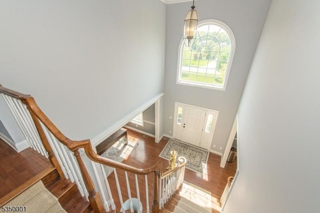 8 Marcin Way, Mount Olive Twp, NJ 07836 - entrance foyer featuring wood finished floors, stairs, a high ceiling, and baseboards