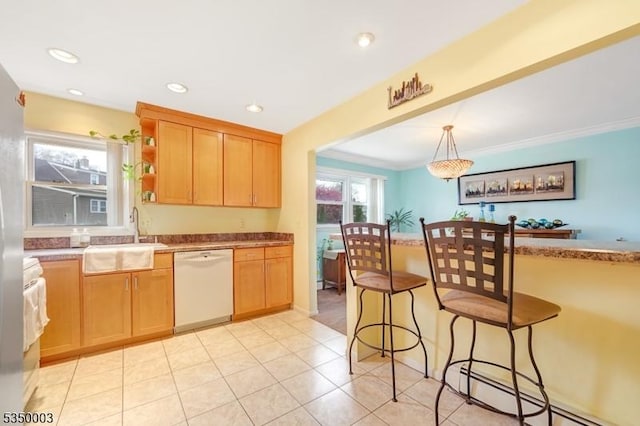 kitchen with white dishwasher, a sink, baseboard heating, a kitchen bar, and open shelves